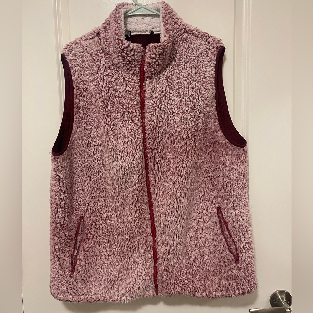Pink Sherpa vest. A bit oversized. I liked to style with a dress.
